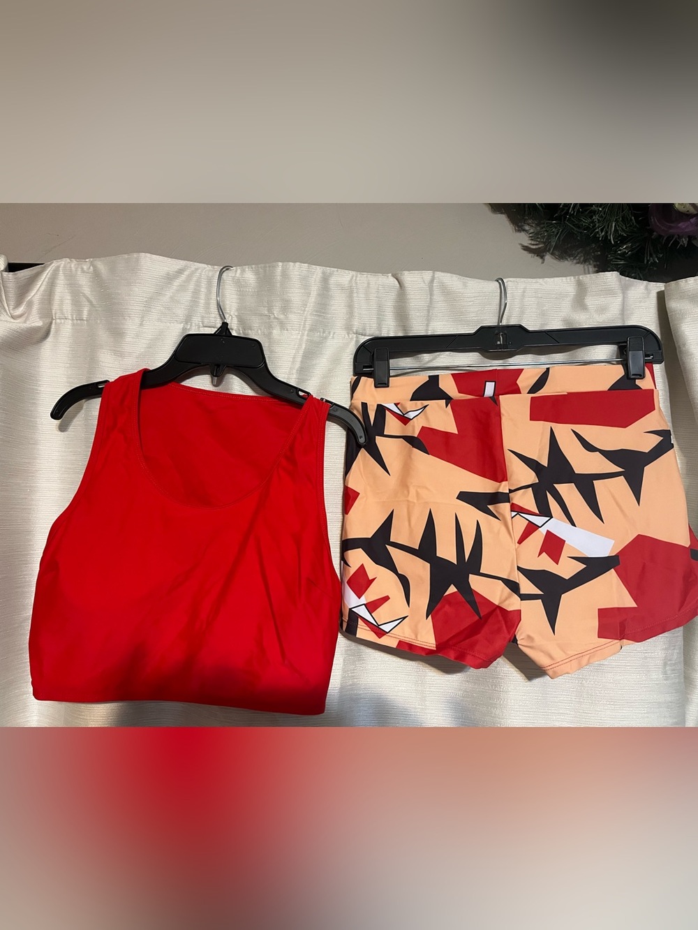 NWOT  L bathing suit with red sports bra top and patterned boy shorts.